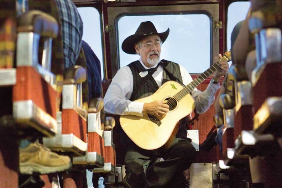 Grand Canyon Railway musician in dome aisle