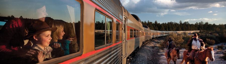 Kids on a train with their mom