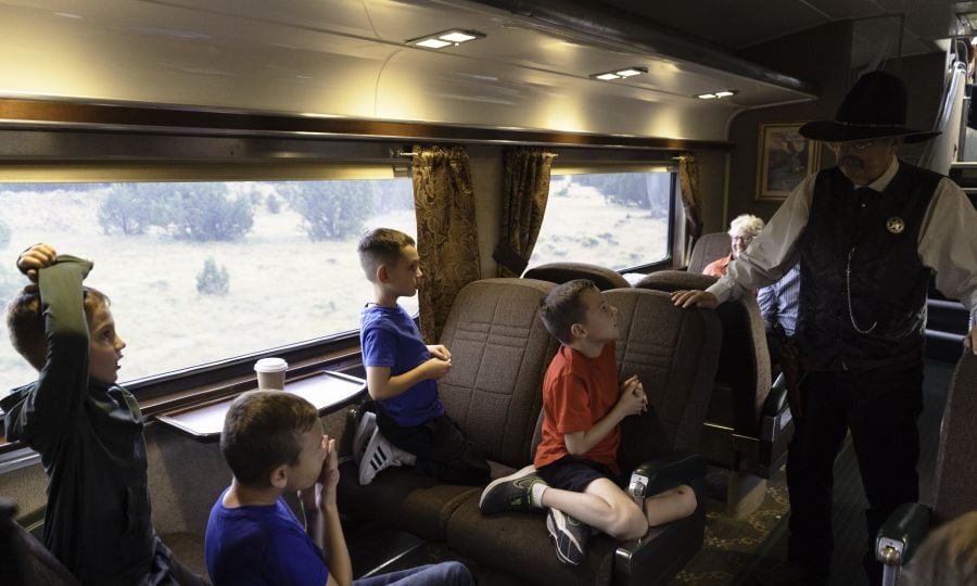 Kids interacting with cowboys